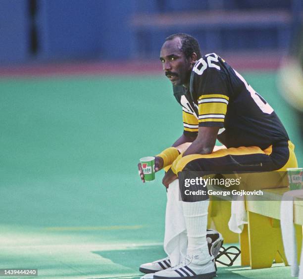 Wide receiver John Stallworth of the Pittsburgh Steelers looks on from the sideline during a National Football League game at Three Rivers Stadium in...