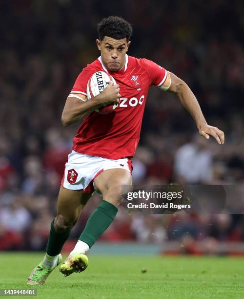 Rio Dyer of Wales runs with the ball during the Autumn International match between Wales and New Zealand All Blacks at the Principality Stadium on...