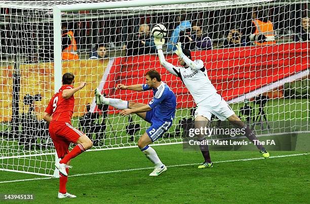 Petr Cech of Chelsea saves a header from Andy Carroll of Liverpool during the FA Cup Final with Budweiser between Liverpool and Chelsea at Wembley...