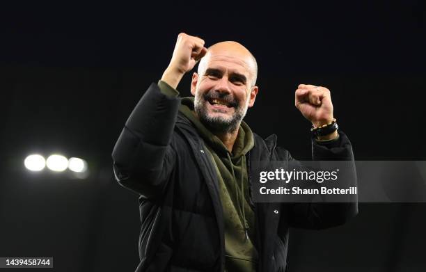 Manchester City manager Pep Guardiola celebrates after their sides victory during the Premier League match between Manchester City and Fulham FC at...