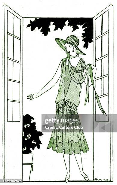 Dress in May 1925 . Summer fashions , woman stands at open French windows with flowing scarves, wide brimmed picture hat. Les Modes de la Femme de...