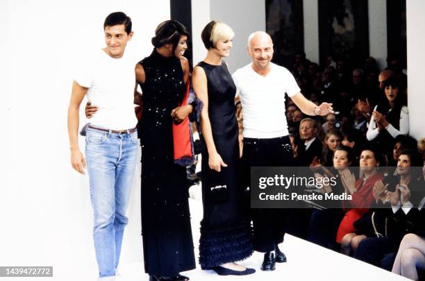 Designers Domenico Dolce and Stefano Gabbana on the runway at show finale with models Naomi Campbell and Linda Evangelista. Journalist Suzy Menkes...