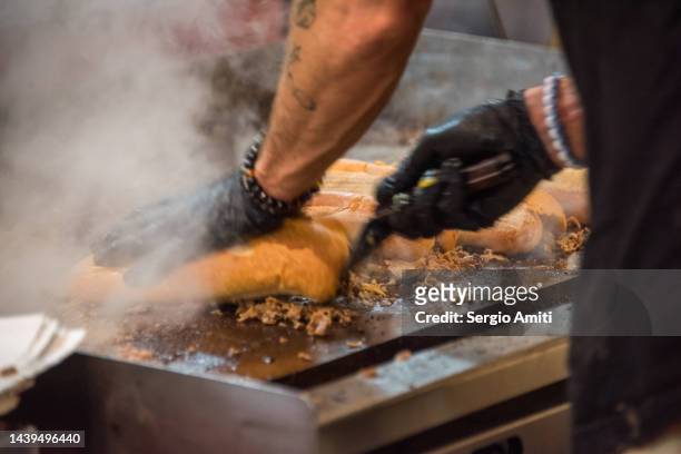 cooking ribeye steak for philadelphia cheesesteak on  a griddle - griddle stock pictures, royalty-free photos & images