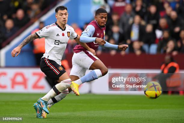 Leon Bailey of Aston Villa scores their team's first goal during the Premier League match between Aston Villa and Manchester United at Villa Park on...