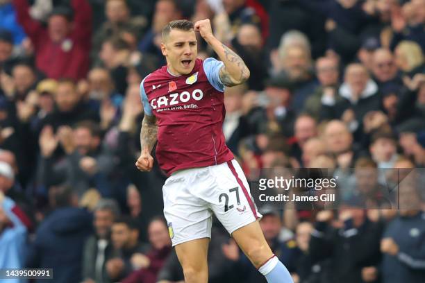 Lucas Digne of Aston Villa celebrates after scoring their team's second goal during the Premier League match between Aston Villa and Manchester...