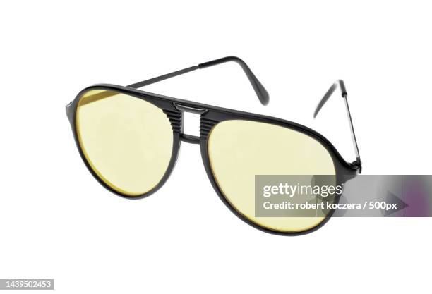 close-up of sunglasses against white background,poland - designer sunglasses stock pictures, royalty-free photos & images