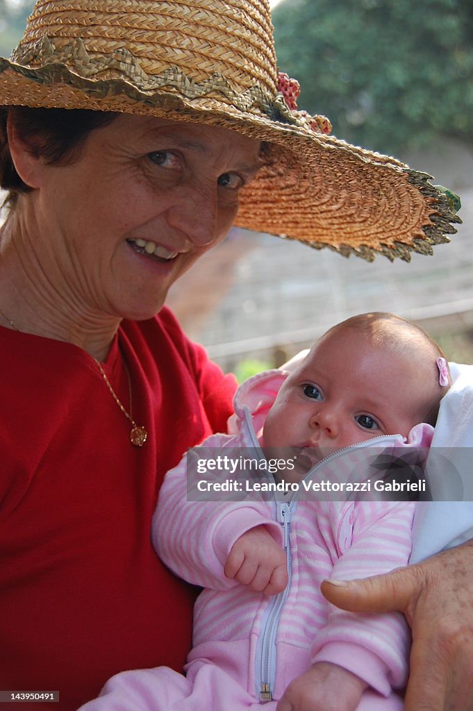 Grandmother holding her grand child