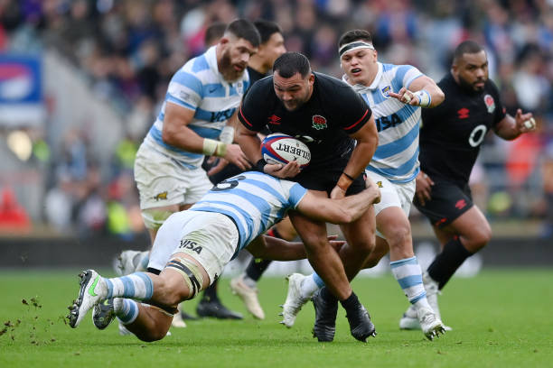 LONDON, ENGLAND - NOVEMBER 06: Ellis Genge of England is tackled by Pablo Matera of Argentina during the Autumn International match between England and Argentina at Twickenham Stadium on November 06, 2022 in London, England. (Photo by Dan Mullan - RFU/The RFU Collection via Getty Images)