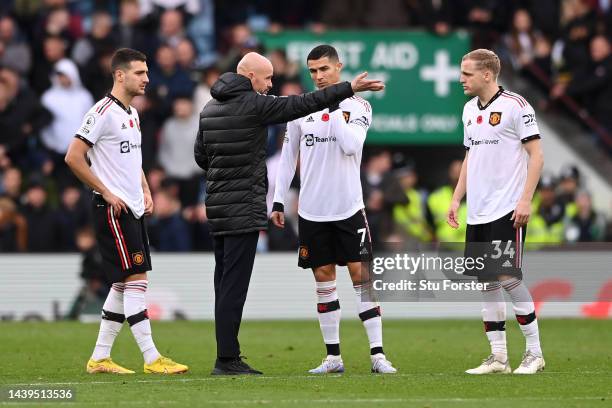 Erik ten Hag speaks to Cristiano Ronaldo of Manchester United during the Premier League match between Aston Villa and Manchester United at Villa Park...