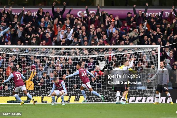 Jacob Ramsey of Aston Villa celebrates after scoring their team's third goal during the Premier League match between Aston Villa and Manchester...