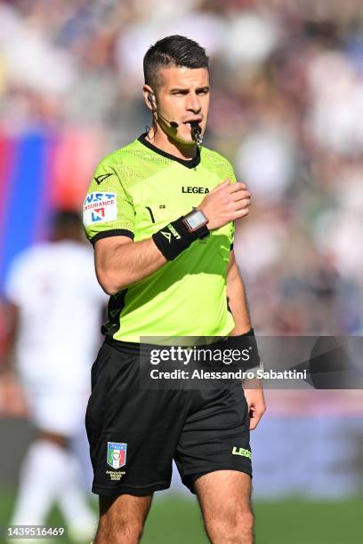 Referee Antonio Guida gestures during the Serie A match between Bologna FC and Torino FC at Stadio Renato Dall'Ara on November 06, 2022 in Bologna,...