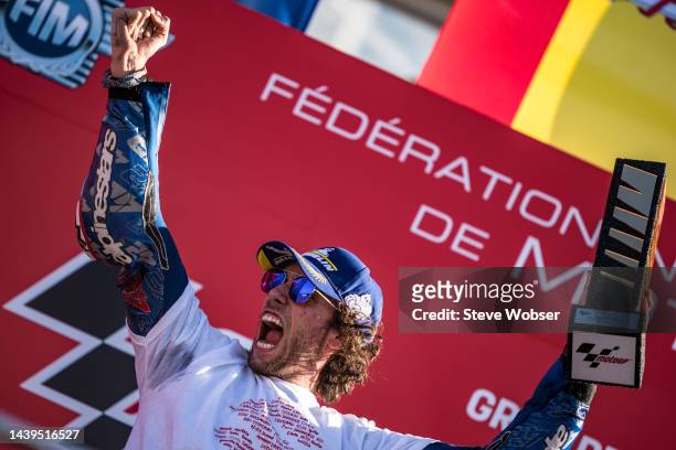 Alex Rins of Spain and Team SUZUKI ECSTAR celebrates his race win on the podium during the race of the MotoGP Gran Premio Motul de la Comunitat...