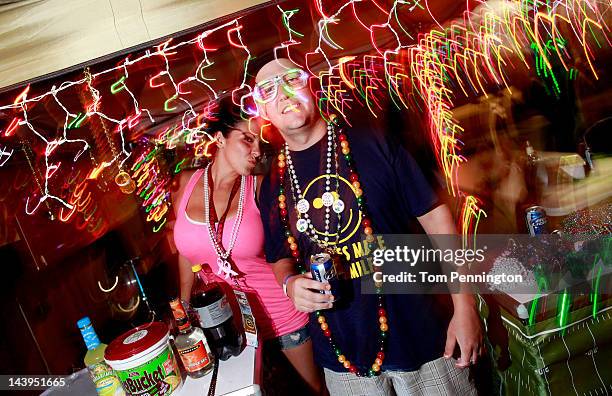 Fans take part in festivities on Talladega Boulevard at Talladega Superspeedway on May 5, 2012 in Talladega, Alabama.