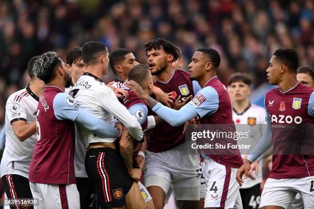 Cristiano Ronaldo of Manchester United clashes with Tyrone Mings of Aston Villa during the Premier League match between Aston Villa and Manchester...