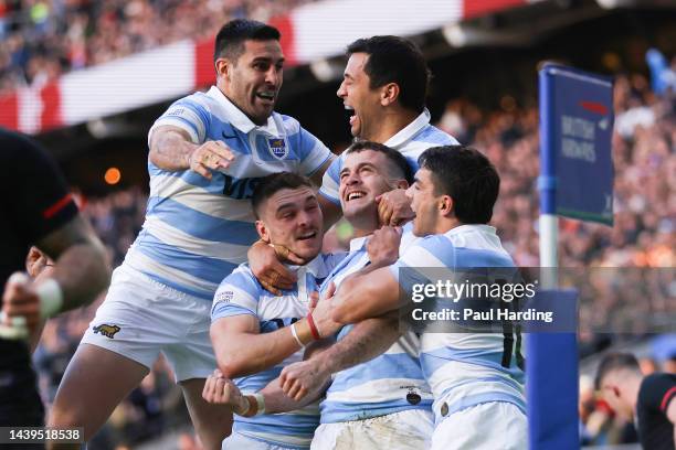 Emiliano Boffelli of Argentina celebrates scoring their side's first try with teammates during the Autumn International match between England and...