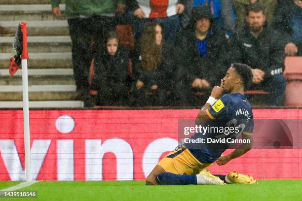 Joe Willock of Newcastle United celebrates after scoring their team's third goal during the Premier League match between Southampton FC and Newcastle...