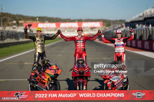 All world champions of the three classes - Moto2 rider Augusto Fernandez of Spain and Red Bull KTM Ajo , Francesco Bagnaia of Italy and Ducati Lenovo...