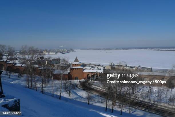scenic view of snow covered landscape against clear sky,nizhny novgorod,nizhny novgorod oblast,russia - nizhny novgorod oblast stock-fotos und bilder