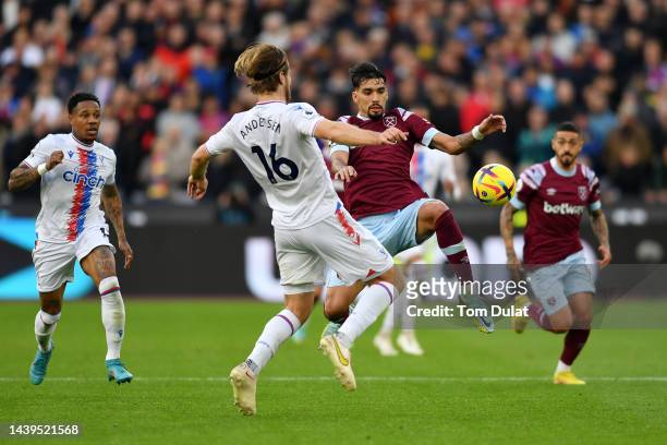 Lucas Paqueta of West Ham United battles for possession with Joachim Andersen of Crystal Palace during the Premier League match between West Ham...