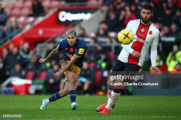 Bruno Guimaraes of Newcastle United scores their team's fourth goal during the Premier League match between Southampton FC and Newcastle United at...