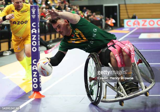 Bayley McKenna of Australia goes over for a try during the Wheelchair Rugby League World Cup Group A match between Australia and Ireland at Copper...