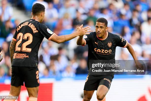 Samuel Lino of Valencia CF celebrates after scoring goal during the LaLiga Santander match between Real Sociedad and Valencia CF at Reale Arena on...