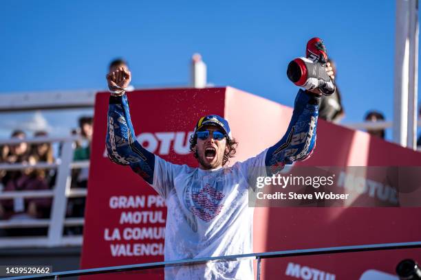 Alex Rins of Spain and Team SUZUKI ECSTAR after his race win on the podium during the race of the MotoGP Gran Premio Motul de la Comunitat Valenciana...