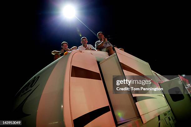 Fans take part in festivities on Talladega Boulevard at Talladega Superspeedway on May 5, 2012 in Talladega, Alabama.