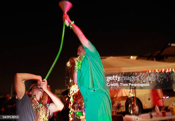 Fans take part in festivities on Talladega Boulevard at Talladega Superspeedway on May 5, 2012 in Talladega, Alabama.