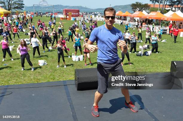 Louis Van Amstel instructs the crowd at the Self Magazine 19th Annual Workout In The Park at Little Marina Green on May 5, 2012 in San Francisco,...