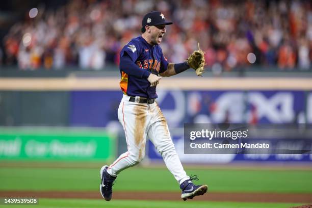 Alex Bregman of the Houston Astros celebrates after the last out to defeat the Philadelphia Phillies 4-1 in in Game Six of the 2022 World Series at...