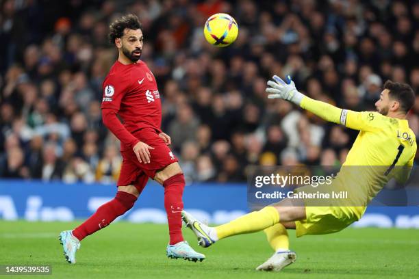 Mohamed Salah of Liverpool scores their team's second goal past Hugo Lloris of Tottenham Hotspur during the Premier League match between Tottenham...