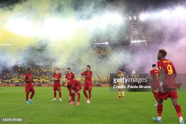 General view as players of AS Roma walk out onto the pitch as fans use smoke flares prior to kick off of the Serie A match between AS Roma and SS...