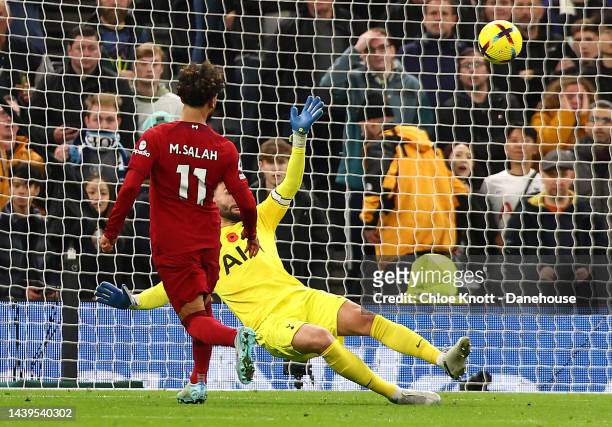 Mohamed Salah of Liverpool scores his teams second goal during the Premier League match between Tottenham Hotspur and Liverpool FC at Tottenham...