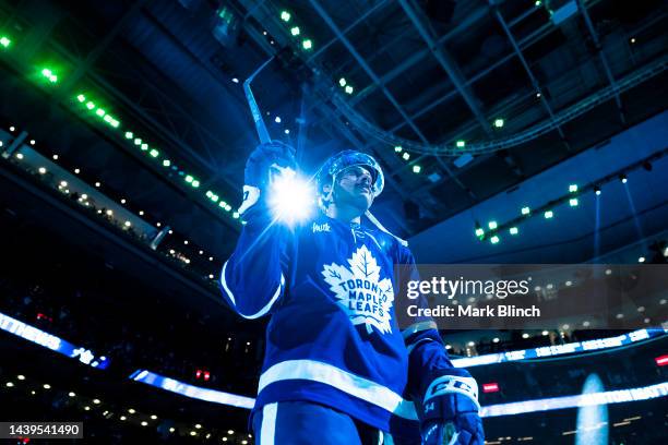 Auston Matthews of the Toronto Maple Leafs salutes the crowd during the three stars presentation after defeating the Boston Bruins at the Scotiabank...