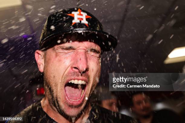 Alex Bregman of the Houston Astros celebrates in the clubhouse after defeating the Philadelphia Phillies 4-1 to win the 2022 World Series in Game Six...