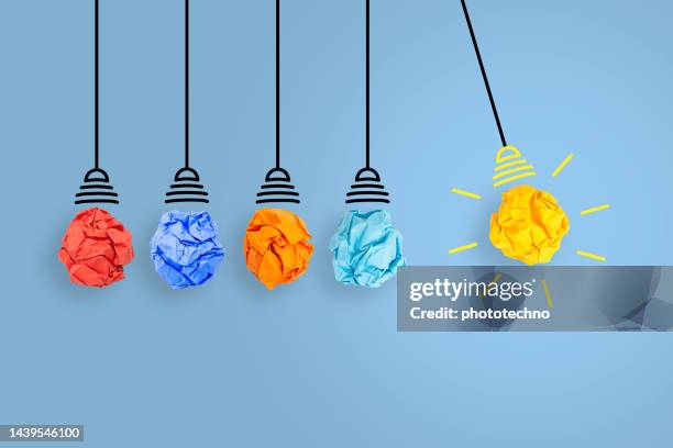 Creative Idea Concepts with Light Bulb Crumpled Paper on Blue ...