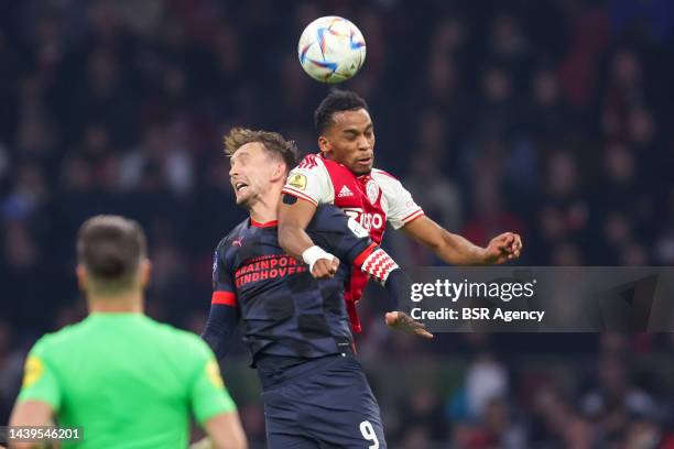 Luuk de Jong of PSV battles for the ball with Jurrien Timber of Ajax during the Dutch Eredivisie match between Ajax and PSV at the Johan Cruijff...