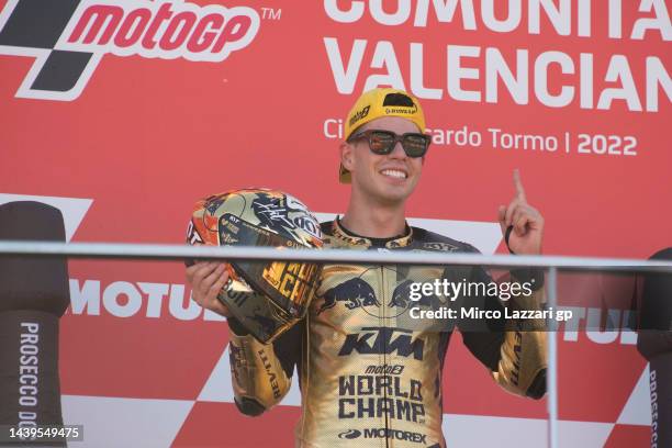 Augusto Fernandez of Spain and Red Bull KTM Team Ajo celebrates onr the podium the second place on the race and became the 2022 Moto2 Champion during...