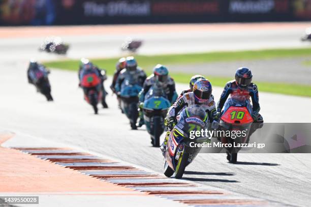 Ayumu Sasaki of Japan and Sterilgarda Husquarna Max Team leads the field during the Moto3 race during the MotoGP of Comunitat Valenciana - Race at...