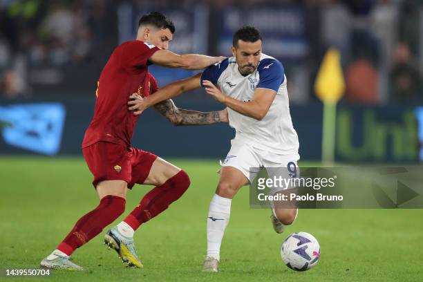 Roger Ibanez of AS Roma challenges Pedro of SS Lazio during the Serie A match between AS Roma and SS Lazio at Stadio Olimpico on November 06, 2022 in...