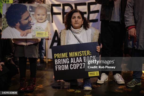 Mona Seif, sister of Alaa Abd el-Fattah, leads a candlelight vigil outside Downing Street on November 06, 2022 in London, England. Amnesty...