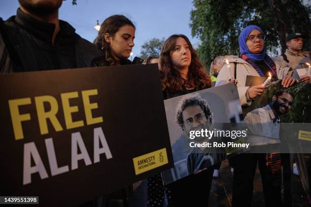 Supporters of Alaa Abd el-Fattah hold a candlelight vigil outside Downing Street on November 06, 2022 in London, England. Amnesty International...