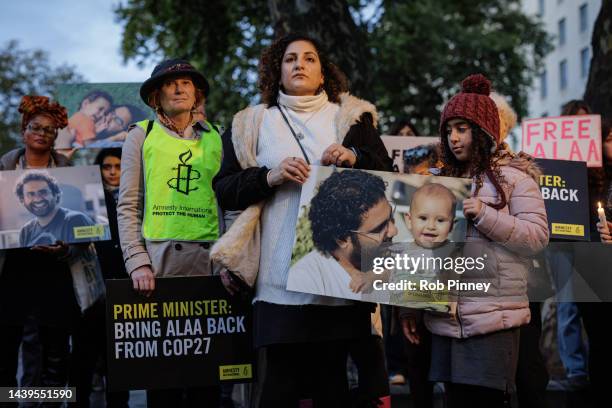 Mona Seif, sister of Alaa Abd el-Fattah, leads a candlelight vigil outside Downing Street on November 06, 2022 in London, England. Amnesty...