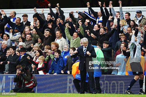 Mark Hughes the Queens Park Rangers manager celebrates at the final whistle as his side win the Barclays Premier League match between Queens Park...