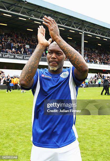 Djibril Cisse of Queens Park Rangers applauds his sides fans following the Barclays Premier League match between Queens Park Rangers and Stoke City...