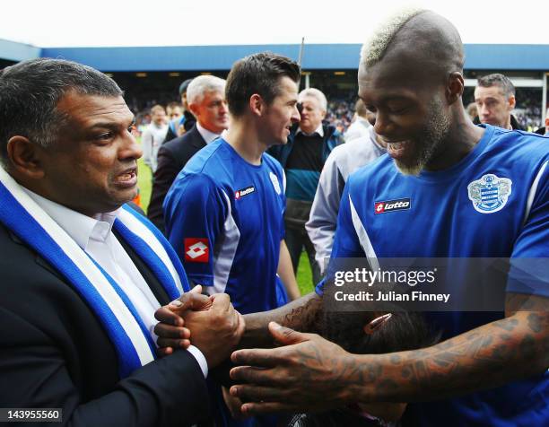 Djibril Cisse of Queens Park Rangers shakes hands with Queens Park Rangers Chairman Tony Fernandes following the Barclays Premier League match...