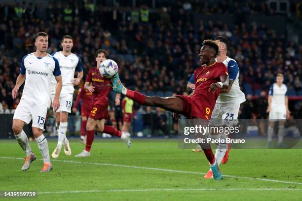 Tammy Abraham of AS Roma shoots while under pressure from Elseid Hysaj of SS Lazio during the Serie A match between AS Roma and SS Lazio at Stadio...