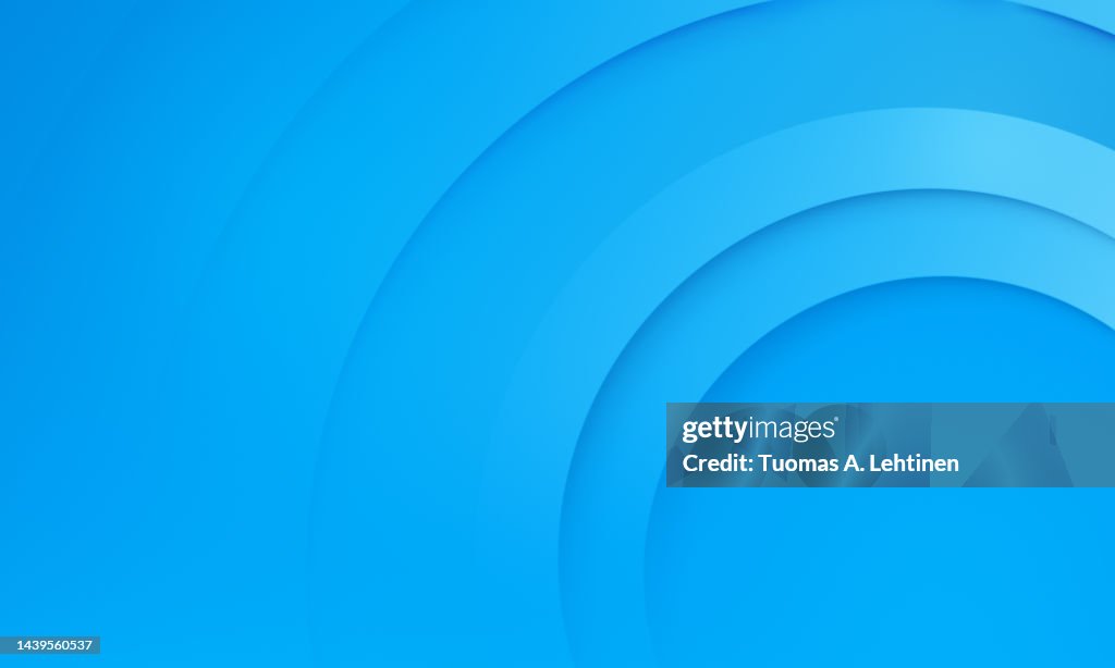 Abstract background of layered light blue circles.