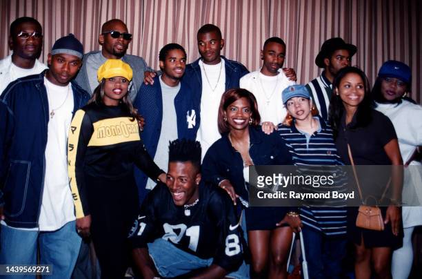 Singer R. Kelly poses for photos with singers Quinnes 'Q' Parker and Michael 'Mike' Keith of 112, actor Larenz Tate, Daron Jones and Marvin 'Slim'...